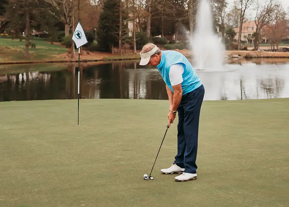 Mike Griffin golfing on green